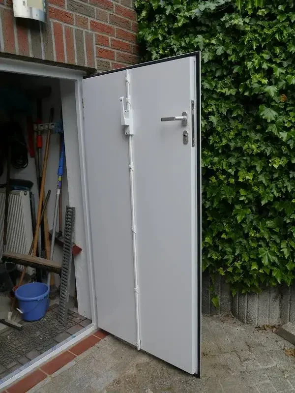 Flood-resistant exterior door example