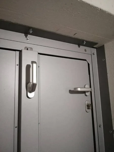 Flood door locking hardware