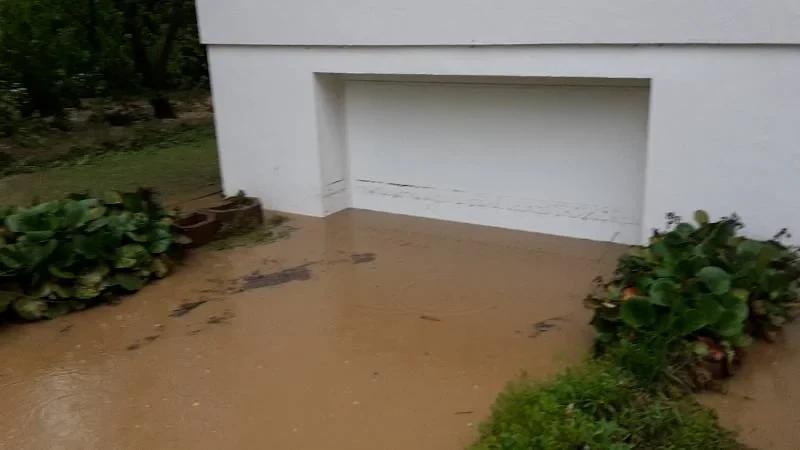 Surface floodwater at a building opening