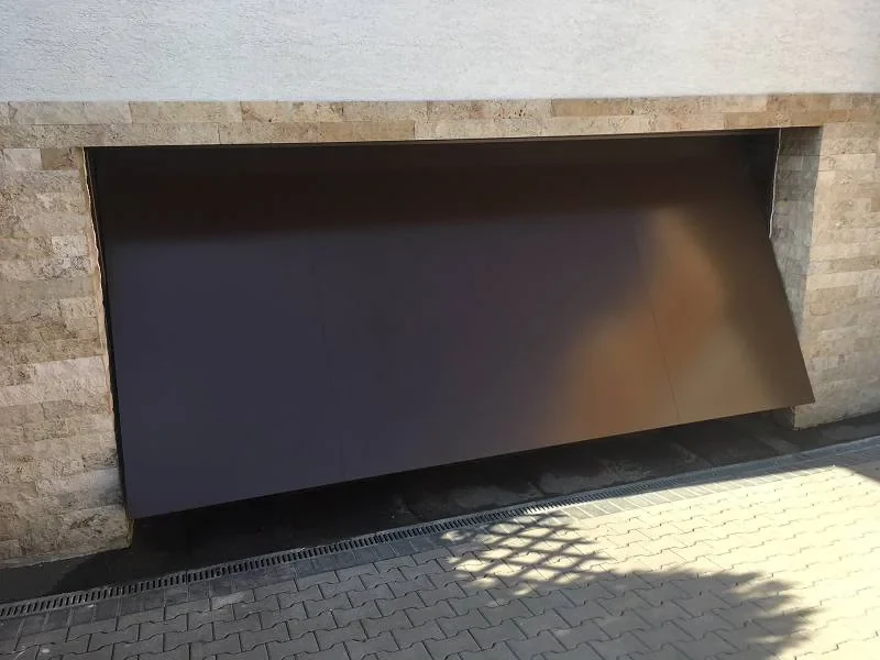 Flood-resistant garage door system example