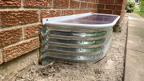 Window-well cover at side angle